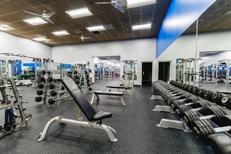 Dumbbell racks and benches at Foundation Fitness Cambridge