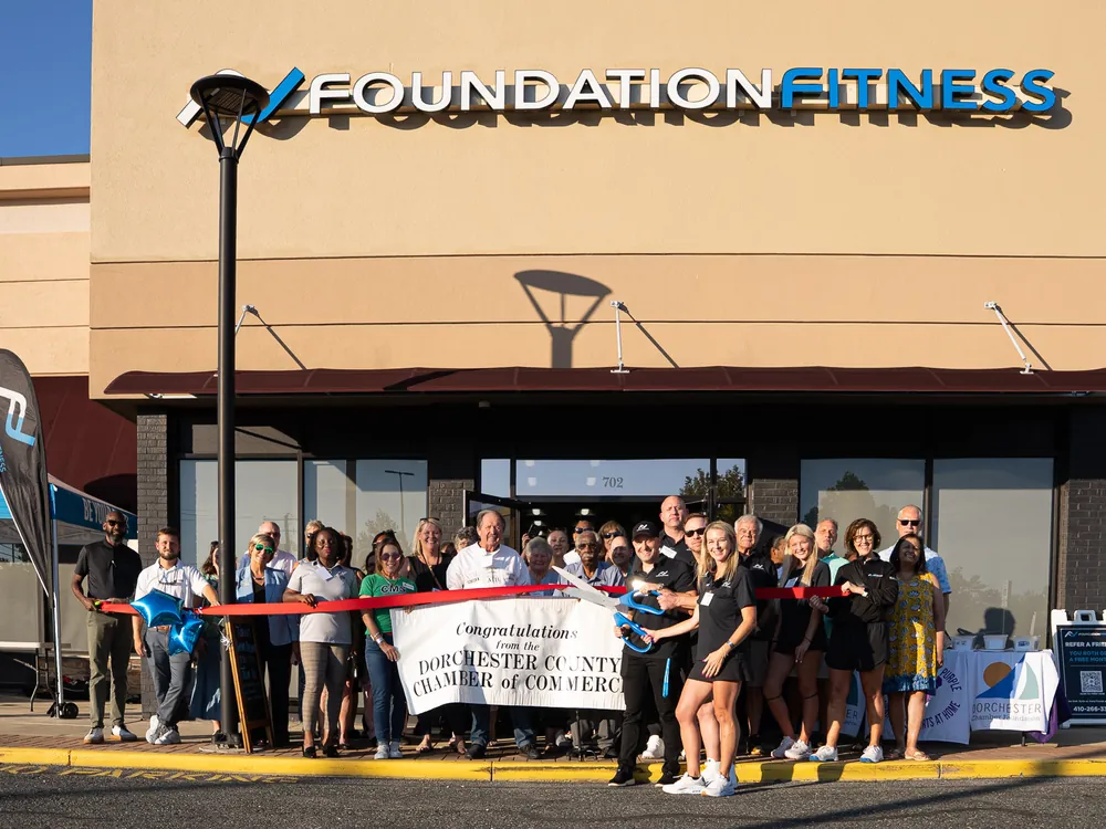 The Foundation Fitness Cambridge team and community at the Grand Re-Opening ribbon cutting